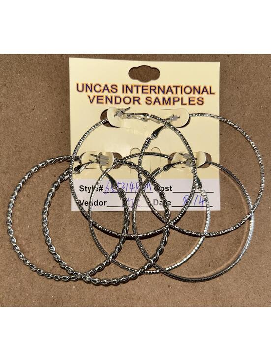 Jewelry - Uncas International, set of 3 silver toned hoops with different textures